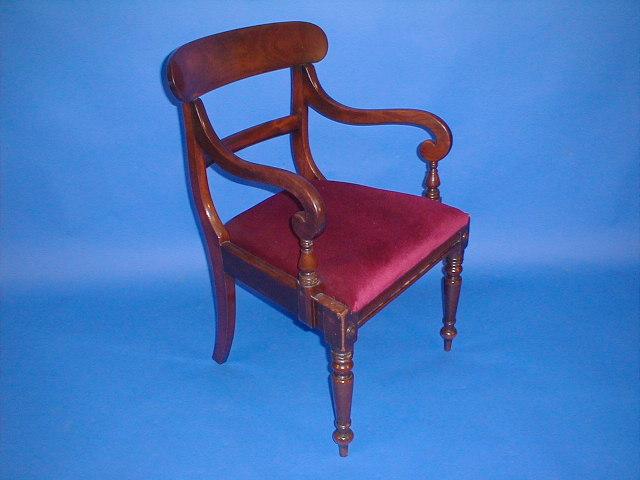 Appraisal: A Victorian mahogany bar back carver chair with drop-in seat