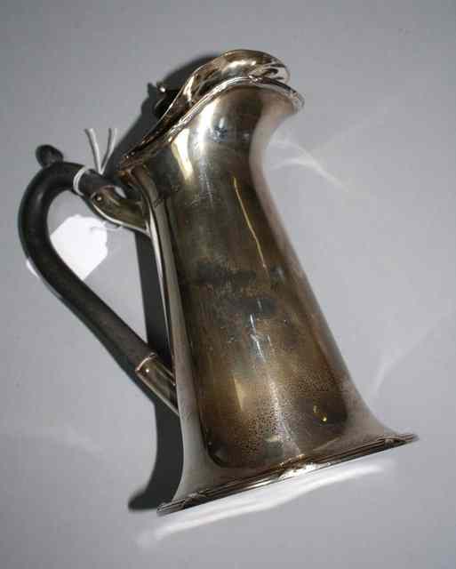 Appraisal: A GEORGE V SILVER WATER JUG with flared body and