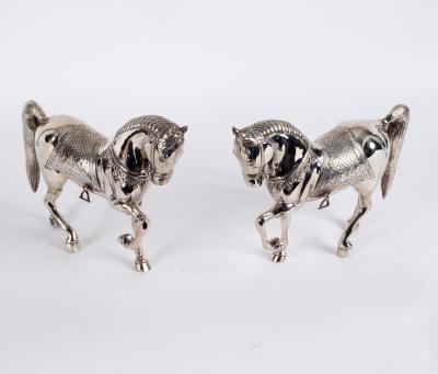 Appraisal: A pair of plated Vienna Spanish Lipizzaner horses cm high