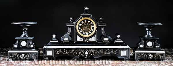 Appraisal: An Art Nouveau Black Marble Clock Garniture c striking bell