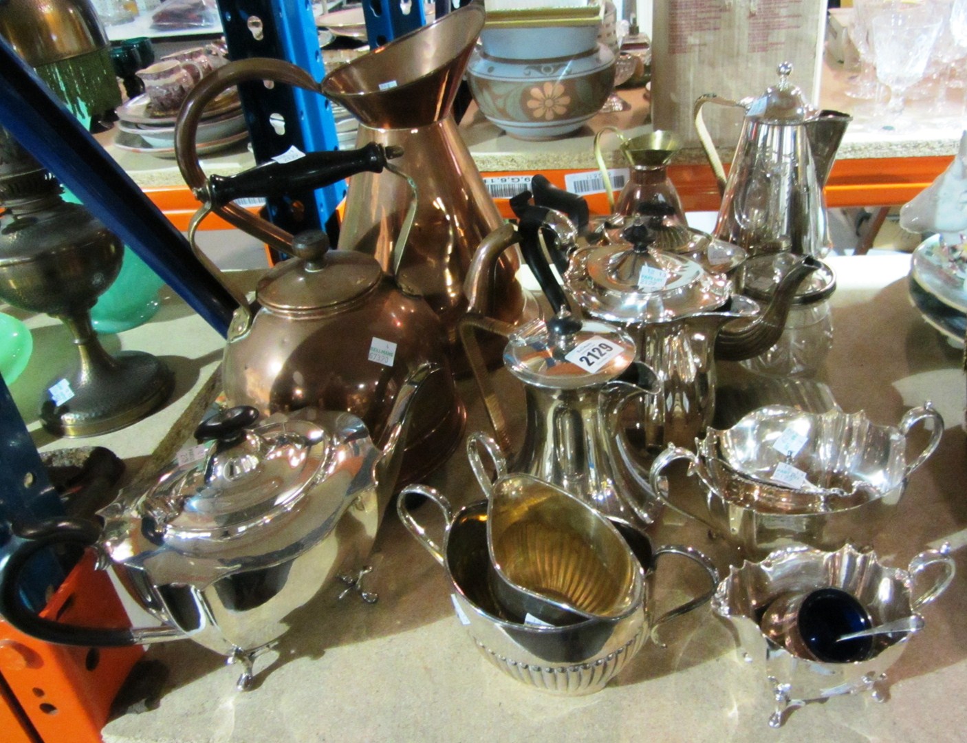 Appraisal: A quantity of silver plate including tea services and a