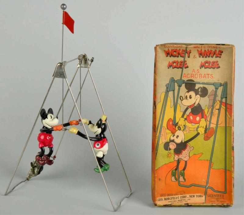 Appraisal: Celluloid Disney Mickey Minnie Acrobat Toys Description Japanese Pre-war Comes