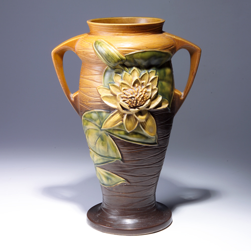 Appraisal: ROSEVILLE Brown Water Lily vase - Minute nick to flower