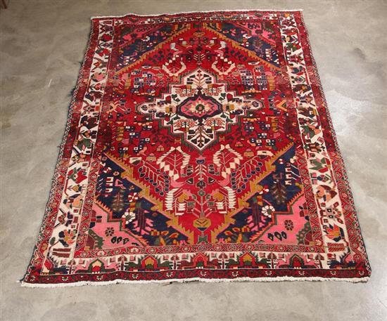 Appraisal: ORIENTAL RUG Heriz pattern with deep red ground ' x