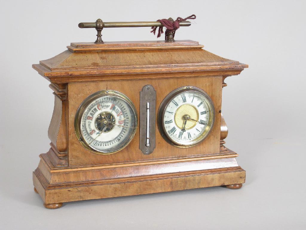 Appraisal: A late Victorian walnut cased Clock aneroid Barometer and Thermometer