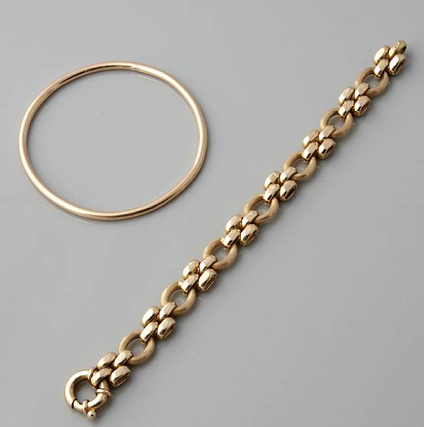 Appraisal: A k gold bangle together with a k gold link