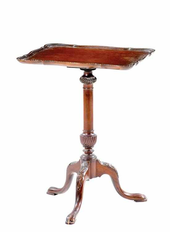 Appraisal: George II style carved mahogany tea table late th century