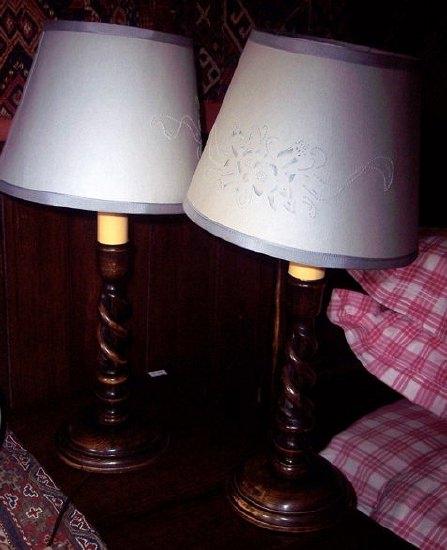 Appraisal: A pair of th Century oak table lamps of open