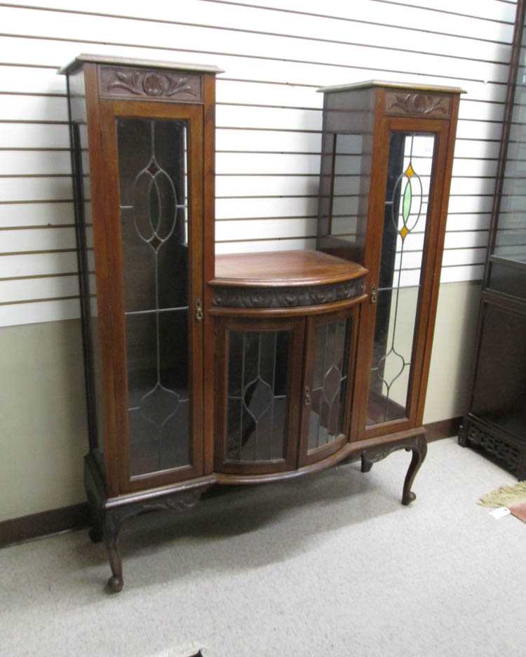 Appraisal: LATE VICTORIAN MAHOGANY CHINA CABINET English c a U-form cabinet