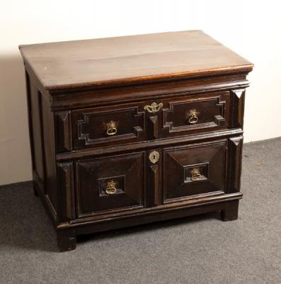 Appraisal: A Charles II oak two-drawer chest circa the top drawer