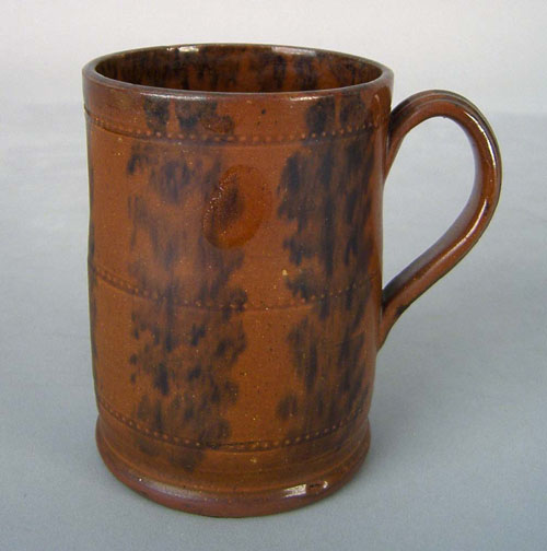 Appraisal: Redware mug th c with beaded bands and manganese splash