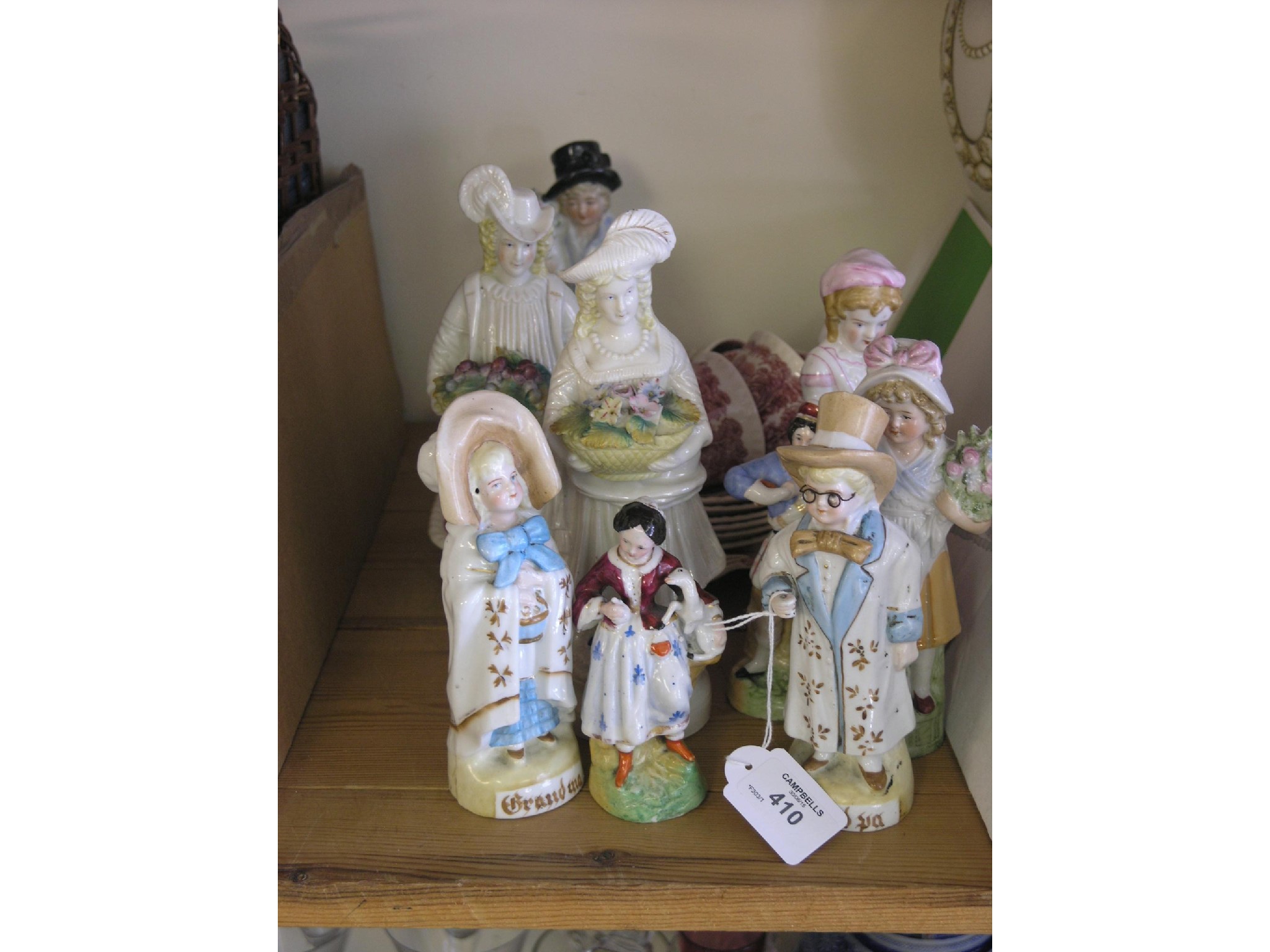 Appraisal: A pair of German porcelain figures Grandpa and Grandma in