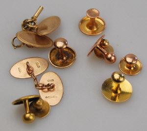 Appraisal: Pair of ct oval cufflinks to w gold watch key