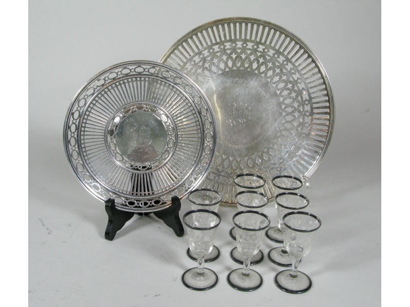 Appraisal: Two Sterling Reticulated Plates Eight Cordials the plates having an