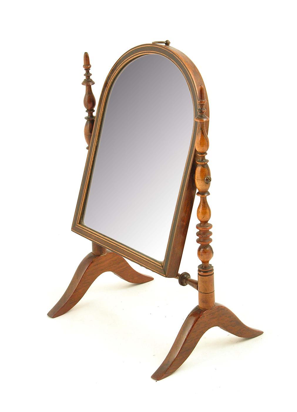 Appraisal: A Victorian rosewood miniature toilet mirror