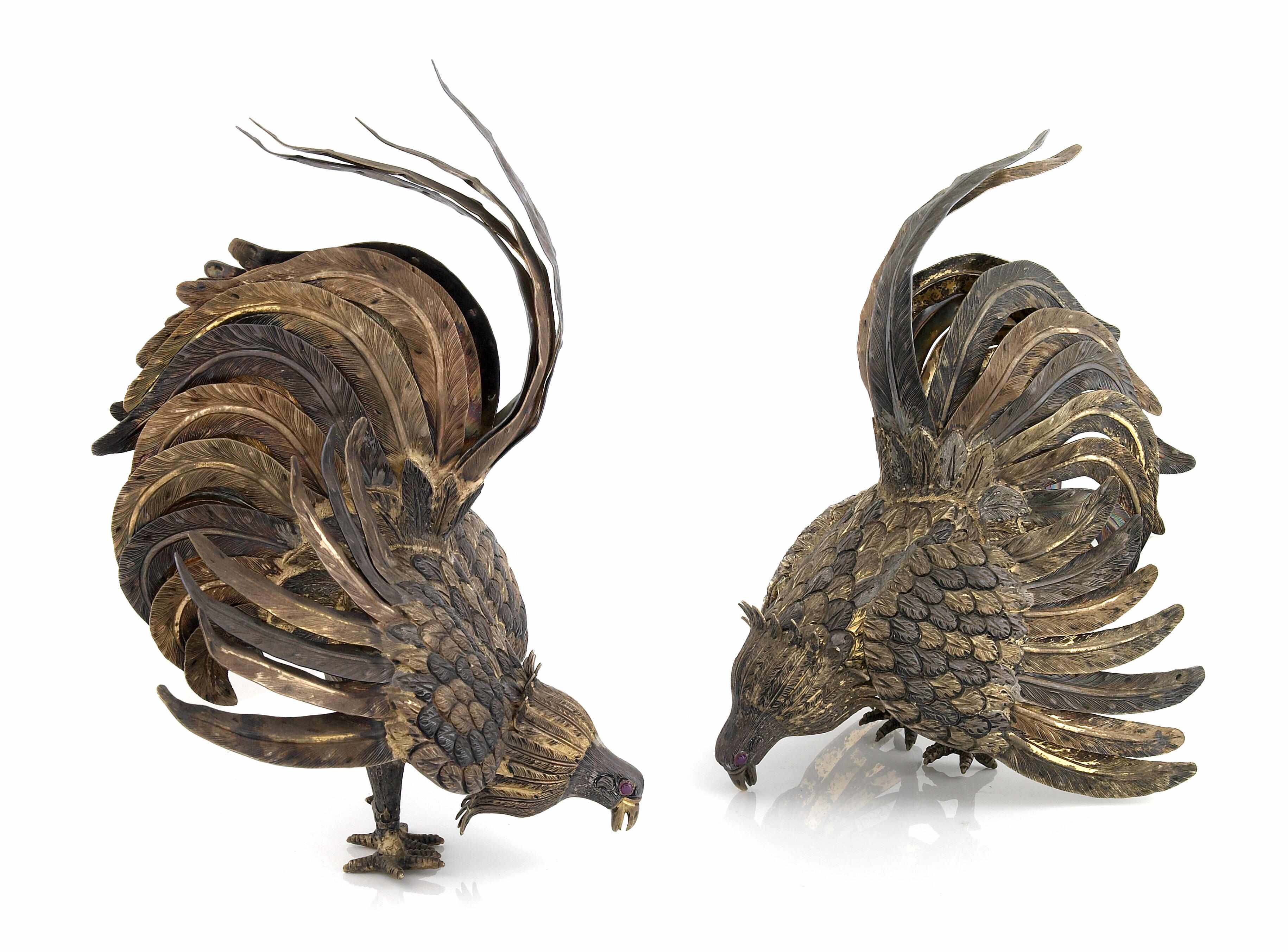 Appraisal: A Mexican sterling-gilt and patinated pair of fighting cockerel figures