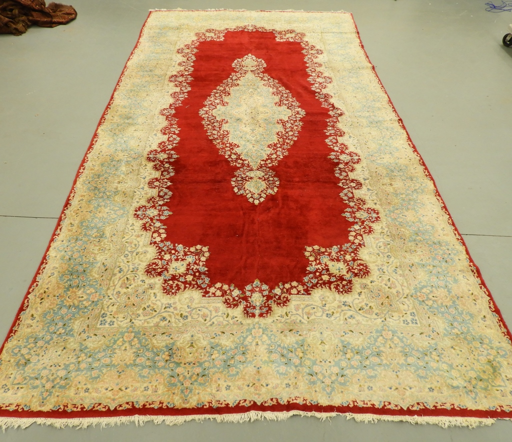 Appraisal: LARGE PALACE SIZE BURGUNDY KERMAN CARPET RUG Persia Mid th