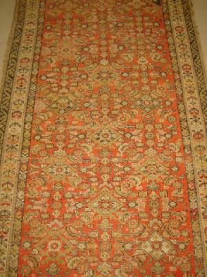 Appraisal: AN ANTIQUE NORTH WEST PERSIAN RUNNER the red field with