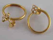 Appraisal: A pair of yellow metal tests carat gold diamond hoop