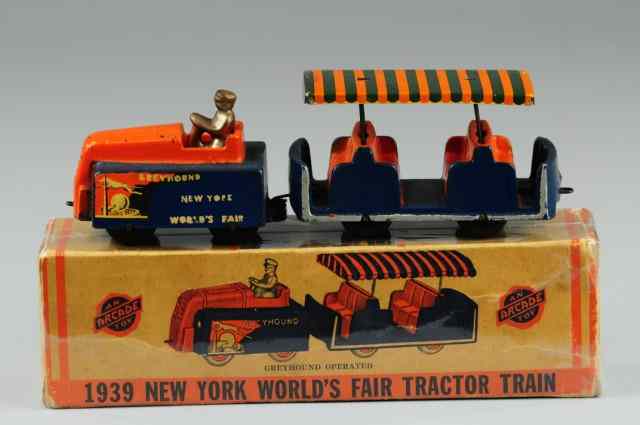 Appraisal: ARCADE BOXED TRACTOR TRAIN Cast iron classic blue and orange