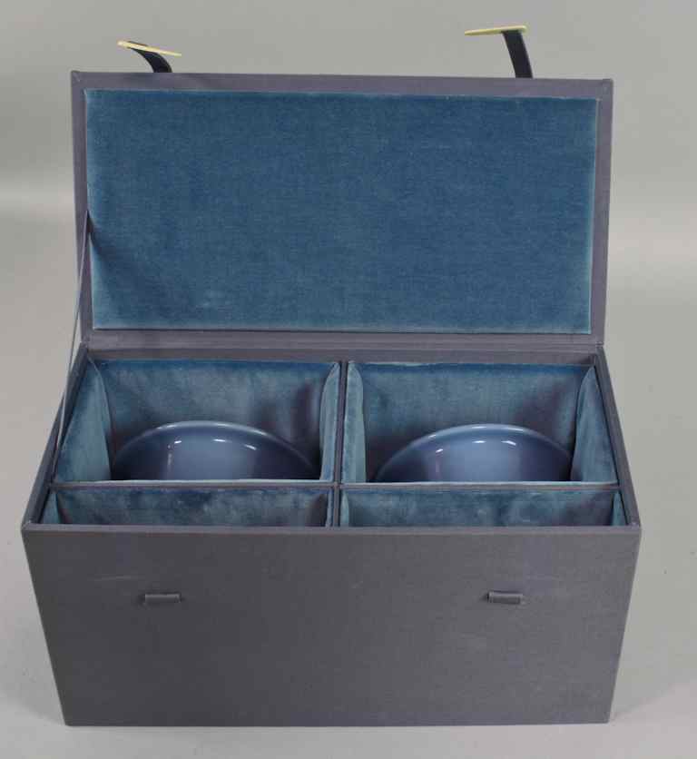 Appraisal: PAIR OF CHINESE PALE BLUE-GLAZED CACHE POTS AND UNDERTRAYS GUANGXU