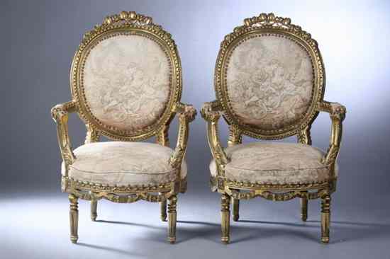 Appraisal: PAIR FRENCH STYLE CARVED GILT-WOOD FAUTEUILS tapestry upholstery Carved round