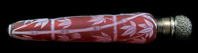 Appraisal: Cameo glass perfume white bamboo decoration on red ground threaded