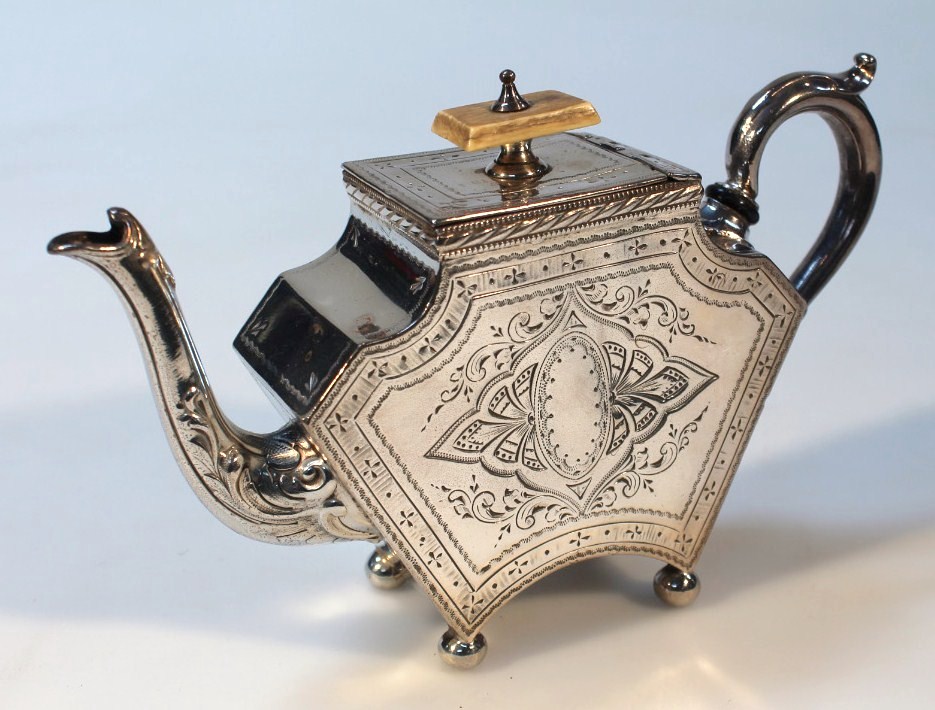 Appraisal: A late Victorian silver plated teapot of small proportions with