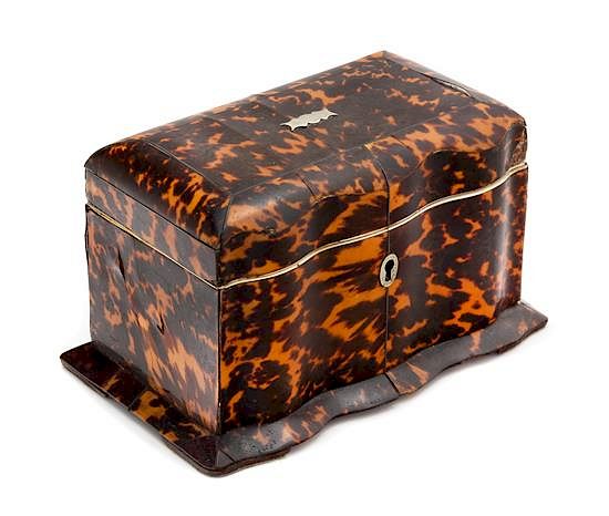 Appraisal: An English Silver-Lined Tortoise Shell Tea Caddy Height x width