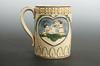 Appraisal: MUG - Prattware mug embossed with children and animals high