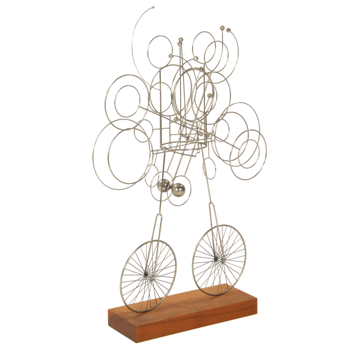 Appraisal: J A Burlini kinetic sculpture walnut base supports a metal