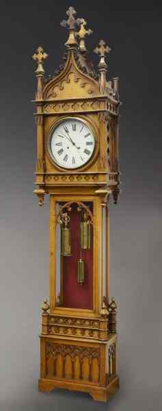 Appraisal: English Gothic style long case clock the pediment of Gothic