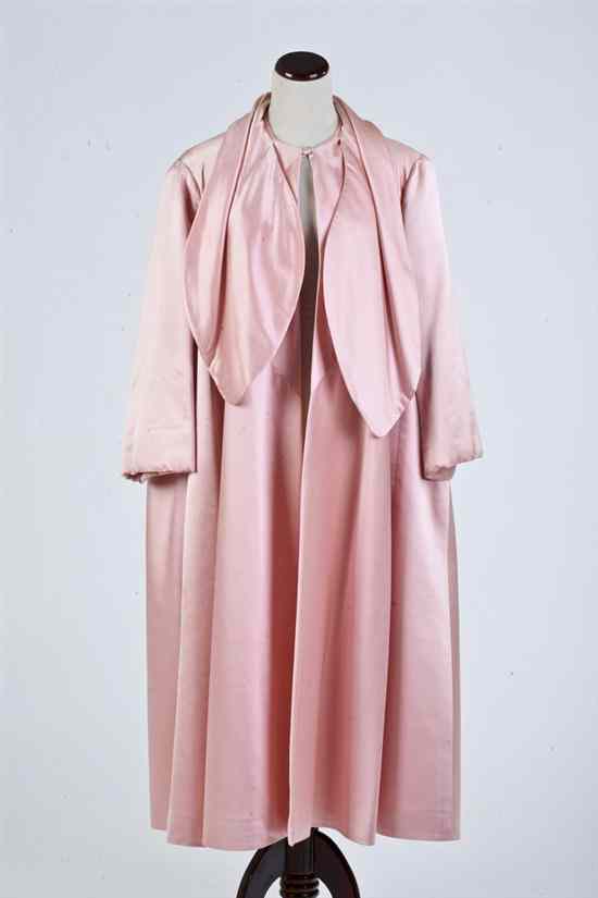 Appraisal: VINTAGE TRAINA-NORELL PINK SILK SATIN EVENING COAT s Swing silouhette