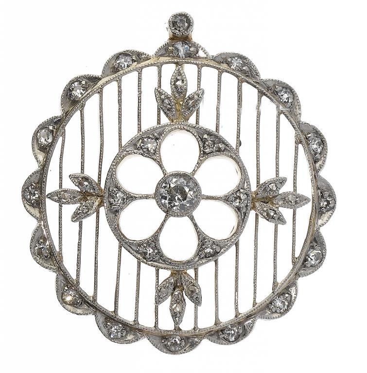 Appraisal: A DIAMOND OPENWORK PENDANT of scalloped circular design with larger