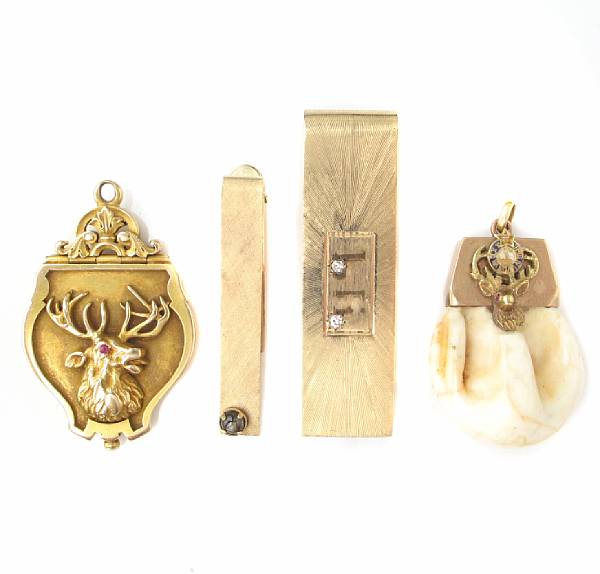 Appraisal: An Elk's Lodge gold pendant with an elk's tooth pendant