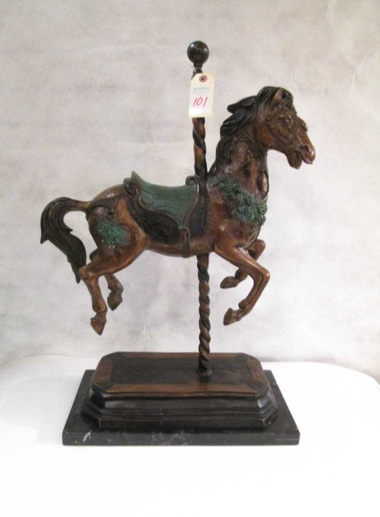 Appraisal: PATINATED AND COLD PAINTED BRONZE SCULPTURE a carousel horse on