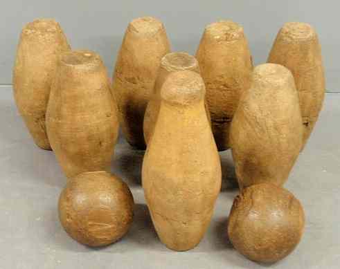 Appraisal: Set of eight carved bowling pins h th th c