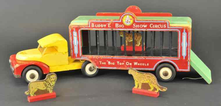 Appraisal: BUDDY 'L' BIG SHOW CIRCUS CAGE TRUCK Wood tractor and