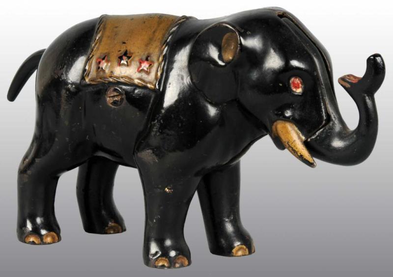 Appraisal: Cast Iron Elephant with Stars Mechanical Bank Description Replaced trunk