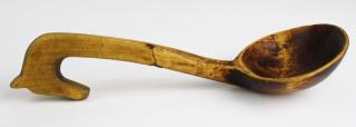 Appraisal: folky late th c carved wooden ladle with horse head