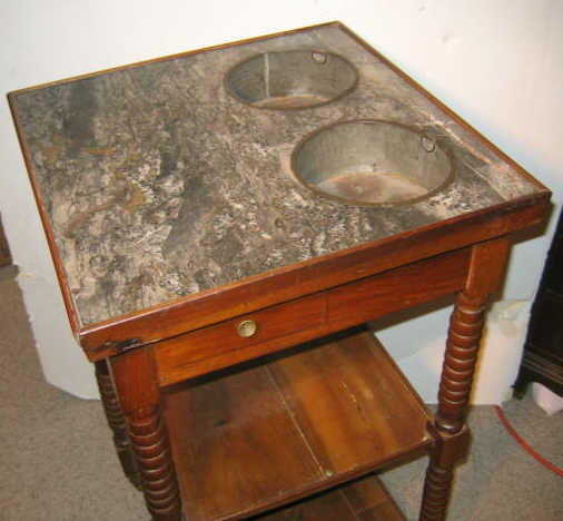 Appraisal: CONTINENTAL TH CENTURY MARBLE TOP WASH STAND Square top inset