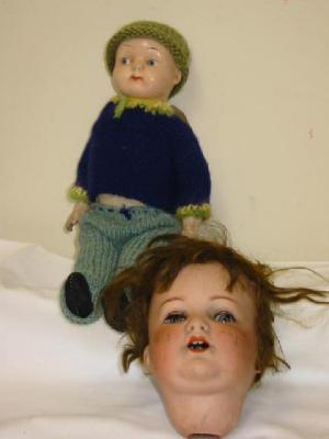 Appraisal: An Marseille Marseille bisque doll's head with blue sleeping eyes