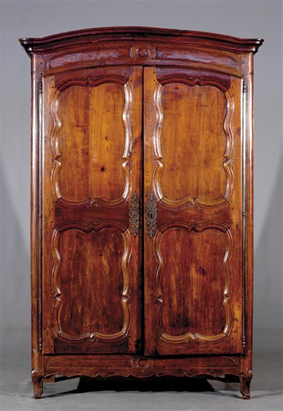 Appraisal: French Provincial carved walnut armoire late th early th centurymolded