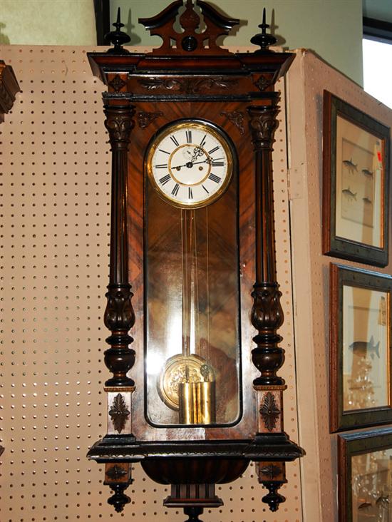 Appraisal: A Vienna Regulator Wall Clock c with an ornate carved