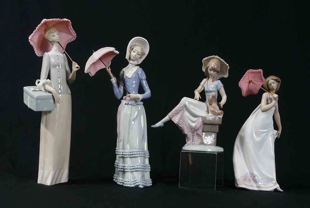 Appraisal: LLADRO PORCELAIN FIGURINES Dressmaker Vincente Martinez sculptor issued retired ''h