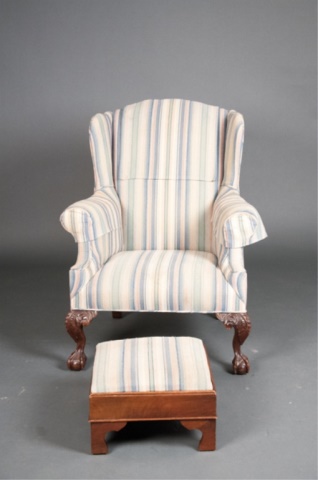 Appraisal: Chippendale Style Wingback Chair and Ottoman With ball and claw