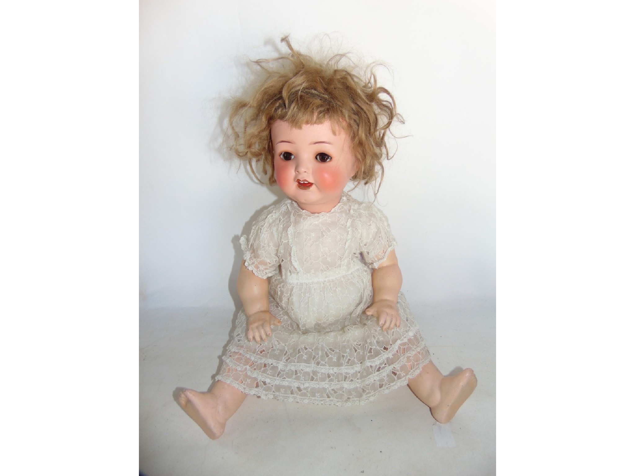 Appraisal: A good quality antique bisque headed German doll marked Heubach