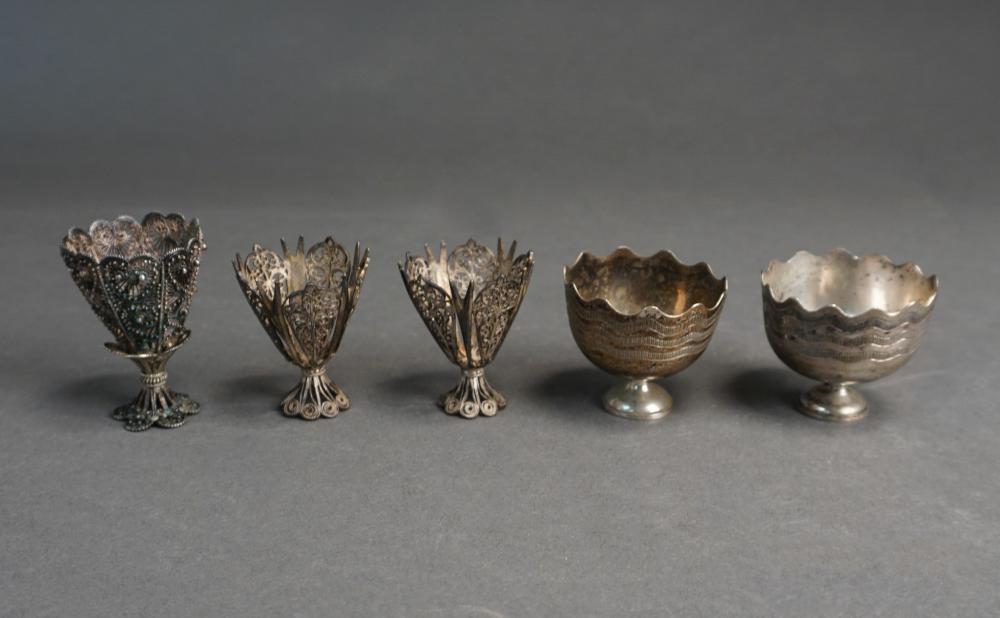 Appraisal: THREE PROBABLY SILVER FILIGREE AND TWO TESTED SILVER ZARF CUPS