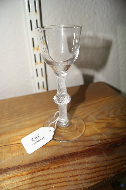 Appraisal: AN ENGLISH ALE GLASS with cotton spiral twist stem circa