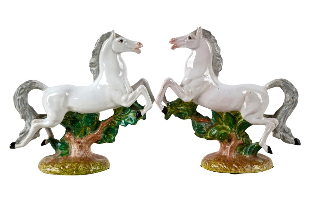 Appraisal: PAIR OF ITALIAN GLAZED CERAMIC HORSEScondition with minor loss to